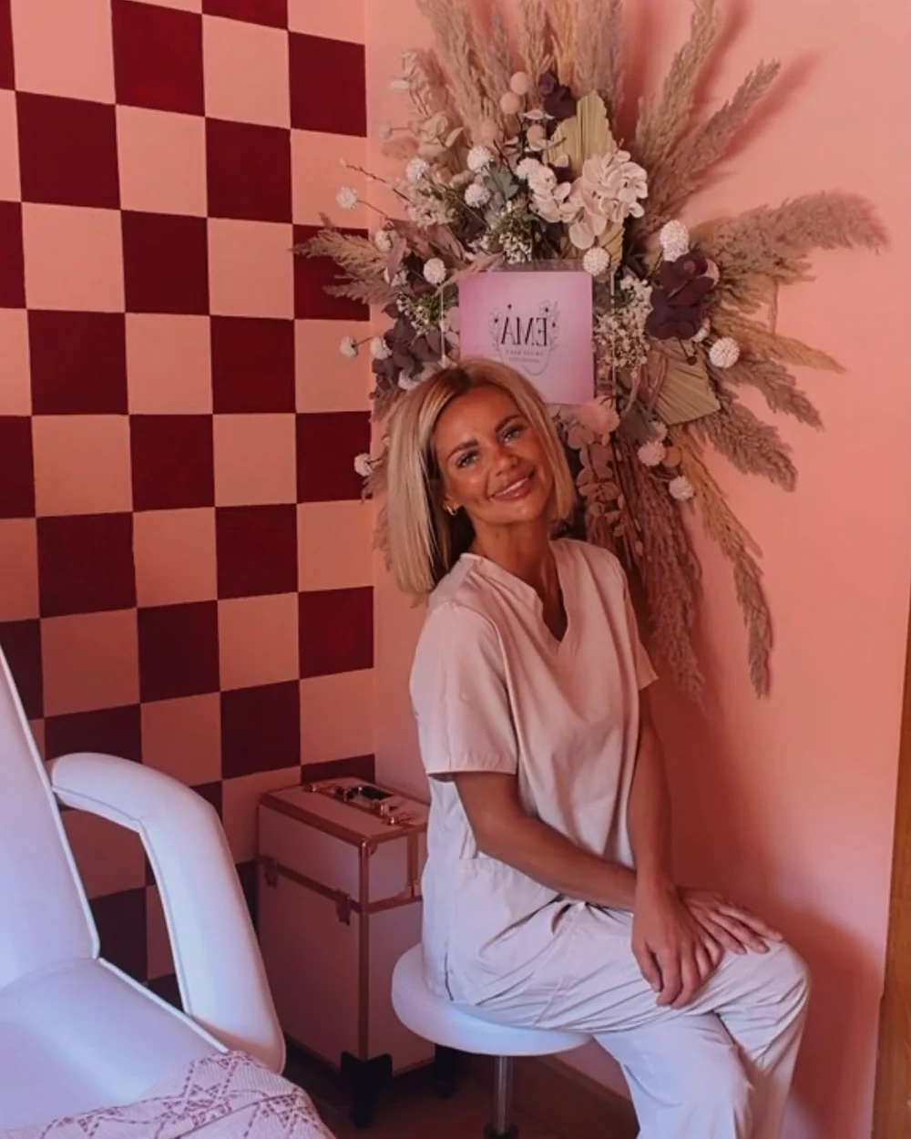 Emilee, registered nurse and founder of EMA Aesthetics, in her treatment room